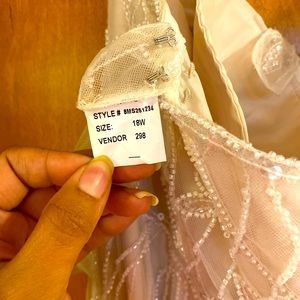 Ivory lace a-line wedding dress iridescent beading.